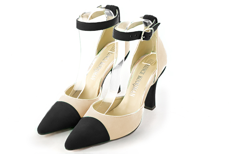 Matt black and champagne white women's open side shoes, with a strap around the ankle. Tapered toe. Very high spool heels. Front view - Florence KOOIJMAN